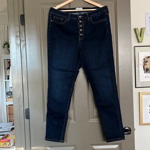 Very stretchy, High rise skinny jean, dark wash with button fly